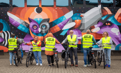 Luk Lemmens naast fiets
